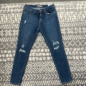 Women's Distressed Blue Jeans